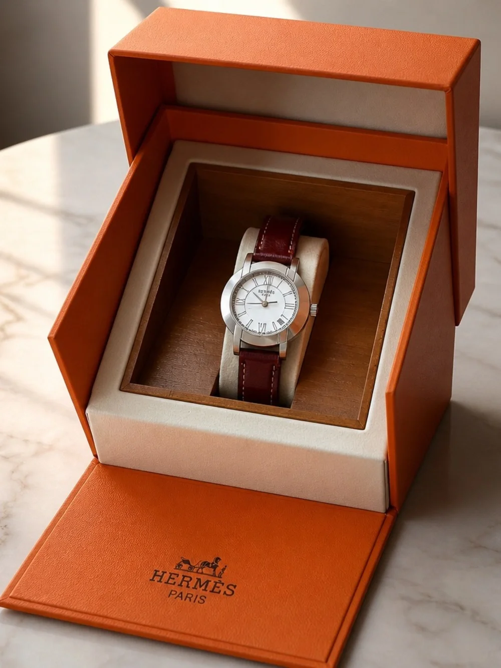 Hermès Silver Dial Women's Watch with Brown Leather Strap